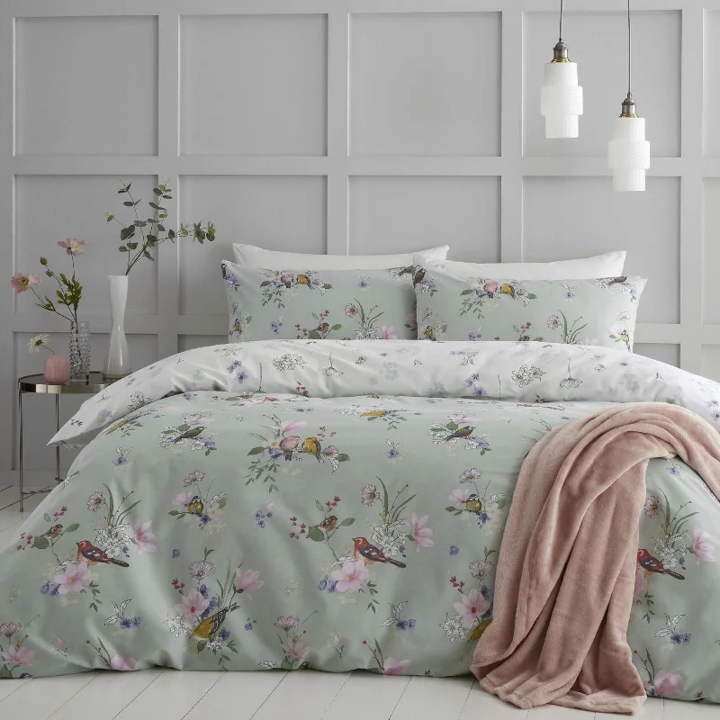 Patchwork duvet covers with a variety of fabric pieces sewn together for a rustic charmSongbird Duvet Cover Set Sage