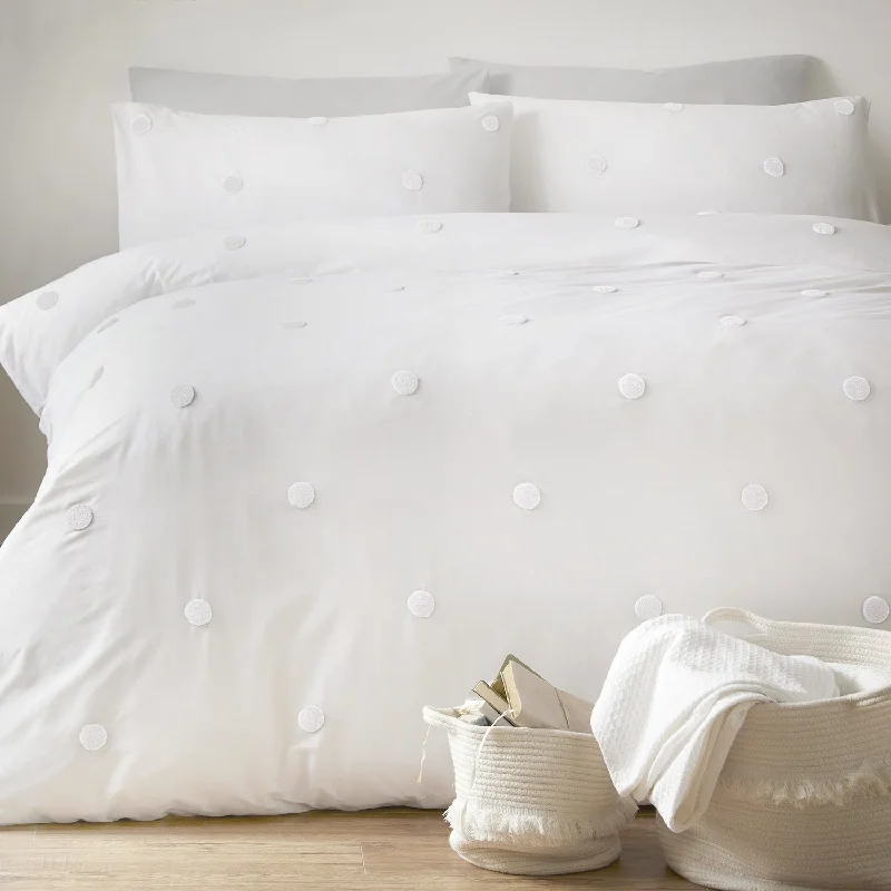 Oversized duvet covers that drape beautifully over the sides of the bed for a luxurious lookDot Garden White 100% Cotton Duvet Set